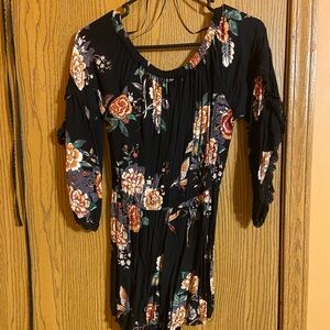 Floral Black Romper with Orange and White Accents